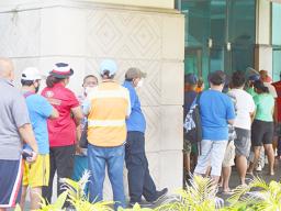 People in line at TBAS