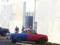 TCF guards changing shifts outside wall