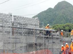 Nana's Construction crew building block wall at TCF