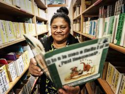 Soreta Felise showing her teaching resources she makes by hand