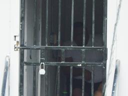 Close up of lock on Temporary Holding Cell door