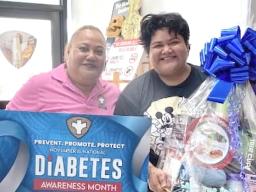 Tisa Reed receiving her Self Care Fridays Challenge prizes