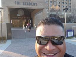 Lt. Tolia Tanu Solaita Jr. in front of FBI Academy