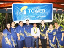 Turnball is pictured with the Tower staff during