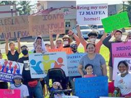 TTFAAS supporters with signs