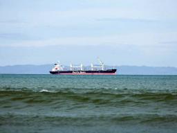 A transshipment vessel off shore of a Pacific island