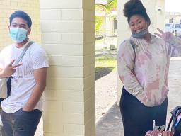 two people givine the V sign