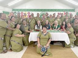 President David Lassner,  UH Chief Global Officer Brent White, Dr. Laura Laolagi, Attorney Ivy Yeung surrounded by staff 