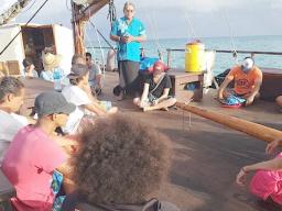 students on Samoan voyaging canoe