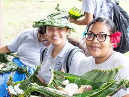 South Pacific students getting ready to enjoy an umu meal they helped prepare