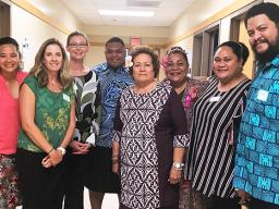 Jessica Podoski (second from left) and the American Samoa climate change working group pausing for a photo with American Samoa’s Congresswoman Aumua Amata (center) 
