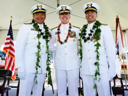 Capt. Arex Avanni (left),Capt. Michael Long (right),Rear Adm. Kevin Lunday (center) 