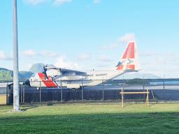 USCG plane on runway at ppg