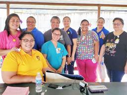 Medical personnel who are part of the COVID-19 Medical Team posing for a photo
