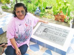 The gravesite of Vaijoresa Uputaua Niuaveve Fitiao