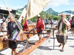 Vaka being carried down to the sea