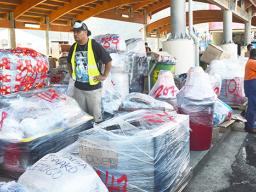 Man with large amount of cargo to load on MV Lady Naomi