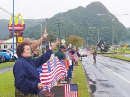 Amata and Veterans wave the U.S. Flag on Veterans Day 2020