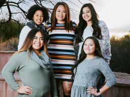 Toalepai pictured with her daughters.