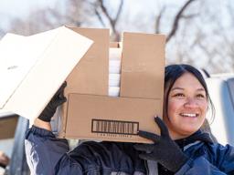 Woman with box of food.
