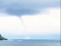 Waterspout just outside Leone bay