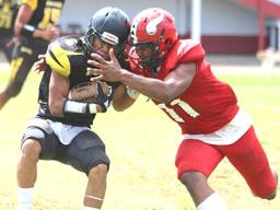 Faga’itua Vikings’ Manuita Sofeni greeting Palepua of the Wildcats