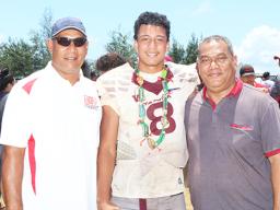 The ‘Sophomore’ quarterback for the Warriors, Francisco Mauigoa (8) posing with his father Fa’alialia Mauigoa (left) and his uncle