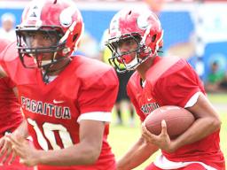 Faga’itua Vikings quarterback Fitu Amata behind his blockers