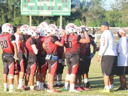 Coaches Jimmy Grey and Meafou Sagapolutele of the JPS Vikings speaking to their players