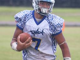 Samoana High School’s JV quarterback, Viliamu Tanielu 