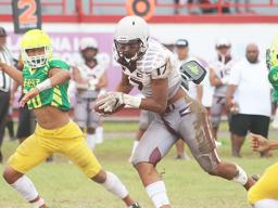 Frank Mulipola weaving his way through midfield 