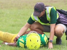 ASHSAA/JPS ATC Florence Wasko tending to an injured Leone Lion