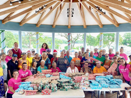 Members of the Rotaract Club with their wrapped gifts