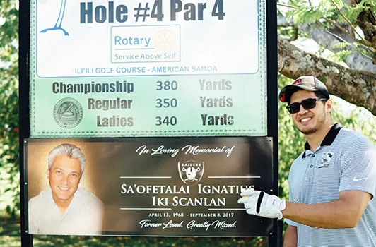 Toa Scanlan in front of his late father Iki's hole #4 sign