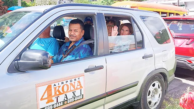 CRUISE SHIP VISITORS IN A TAXI