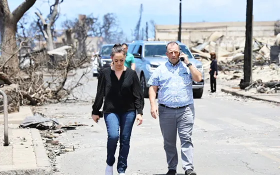 Hawaii Josh Green walking through the disaster area on Maui