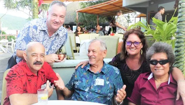 Rotary Club members with incoming member USCG Lt. Chong