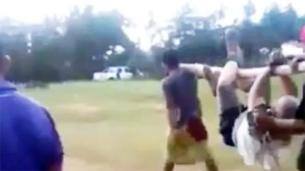 Screenshot of the elderly man who was hog-tied and