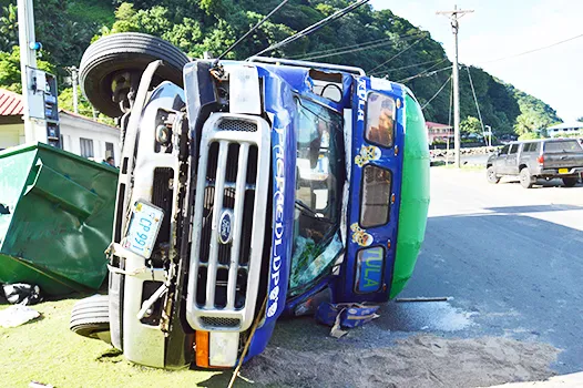 overturned bus in Aua