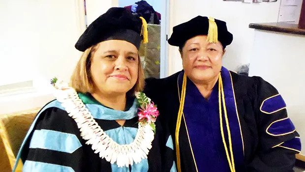 ASCC President Dr. Rosevonne Makaiwi-Pato congratulates Senouefa Talaina Leota-Gogo Mana’o