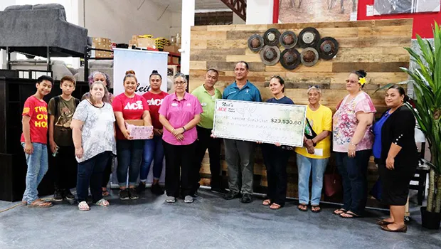 Pictured is the staff of Neil’s ACE Home Center, ASCCC members, cancer patients and their family members. 