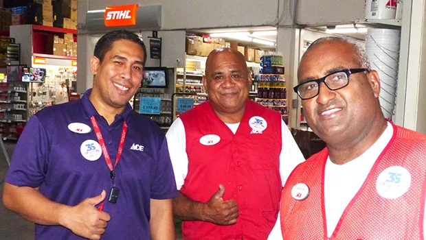 3 Neil’s Ace Home Center employees giving customers a 'thumbs up'