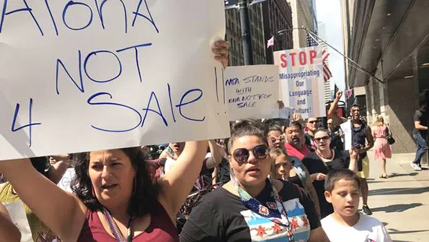 Monday’s protest was organized by the Aloha Center Chicago, an arts and culture organization, the Council for Native Hawaiian Advancement, and ʻIlioʻulaokalani Coalition, a political advocacy group led by kumu hula Vicky Holt Takamine, as well as the Office of Hawaiian Affairs