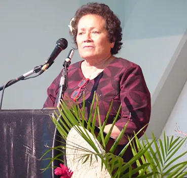 Congresswoman Aumua Amata speaking Wednesday night during a family service for the late ASPA executive director Utu Abe Malae