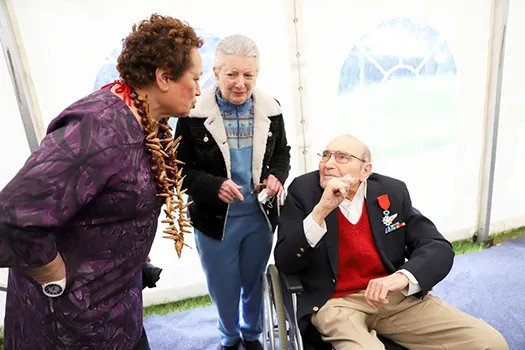 Amata speaks with WWII veteran in London