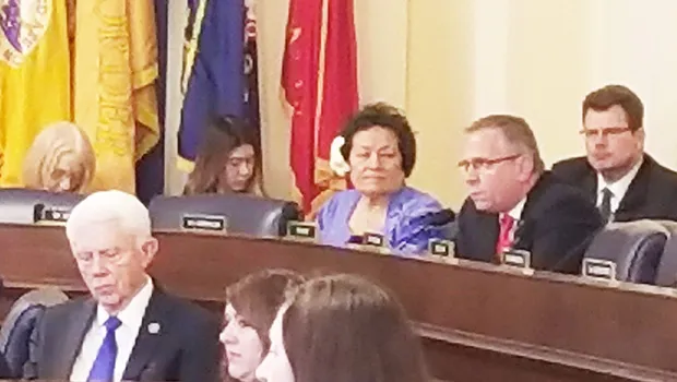 Congresswoman Amata seated by Ranking Member Bost