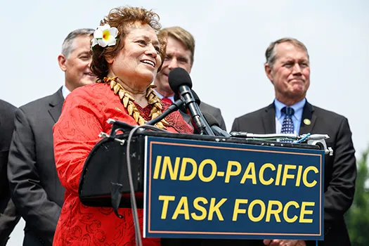 Amata speaking at press conference  
