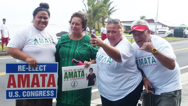 Incumbent Congresswoman Aumua Amata with supporters during her campaign wave at Avau