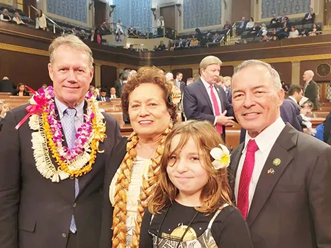 Amata with her granddaughter and others