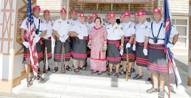 Congresswoman Aumua Amata  and Fitafita guard
